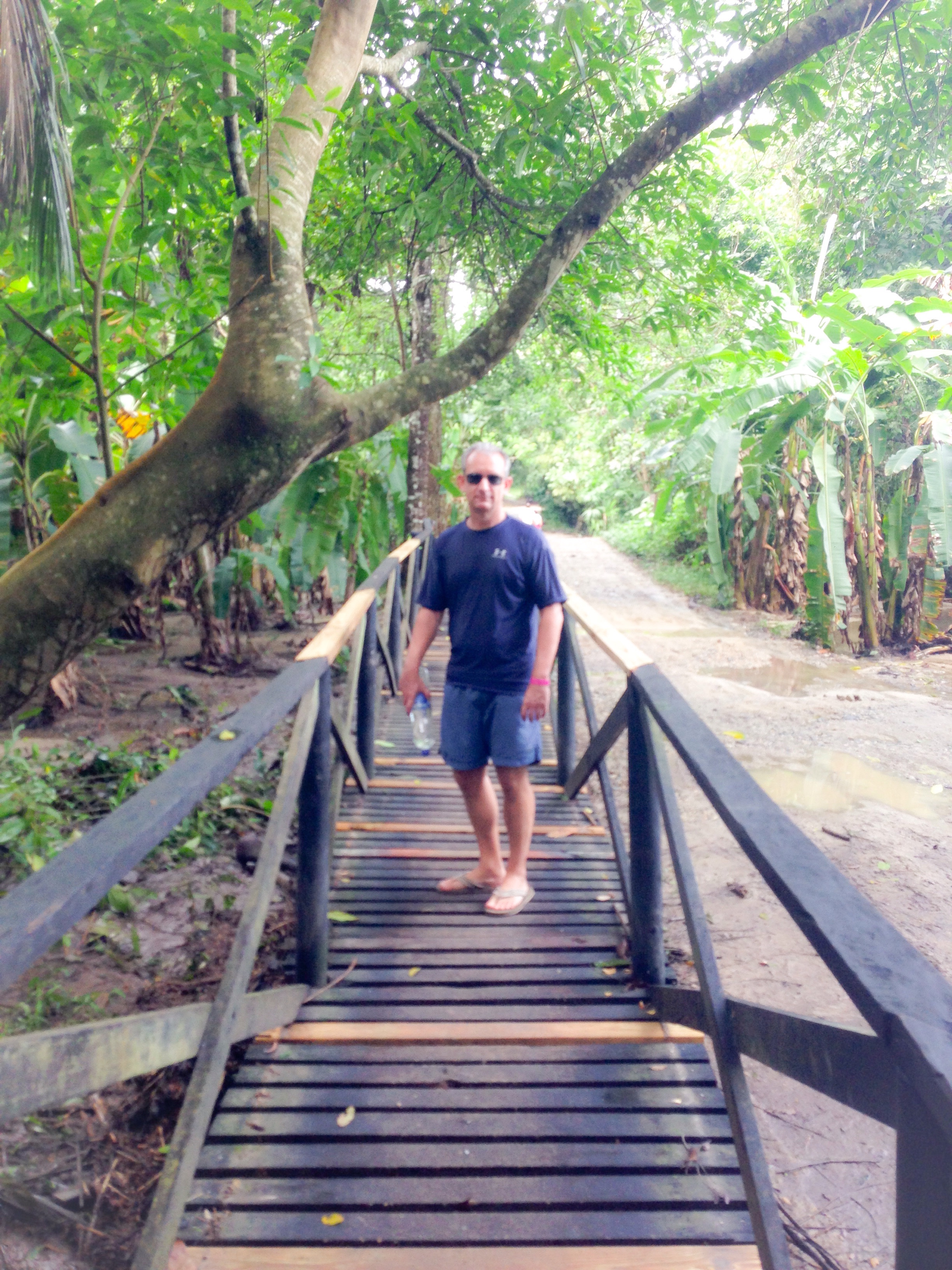 Wayne enjoying a leisurely walk down the wooden path.