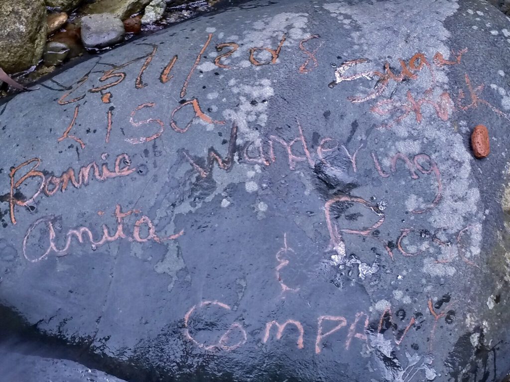 Graffiti to leave our mark - using red rock on rock
