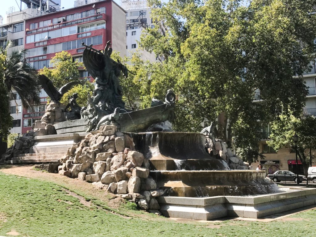 One of many fountains in the parks lining the streets