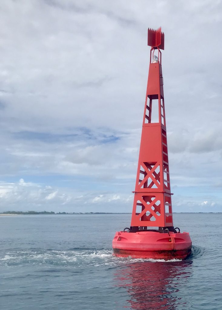 Marker at the Hao Pass with a "slight" current